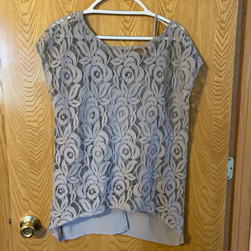 2 piece capped sleeved dress blouse.